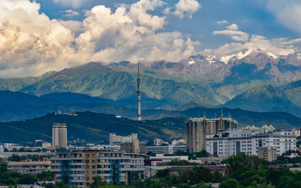 The city of Almaty with the Tian Shan mountains behind — visa for Kazakhstan